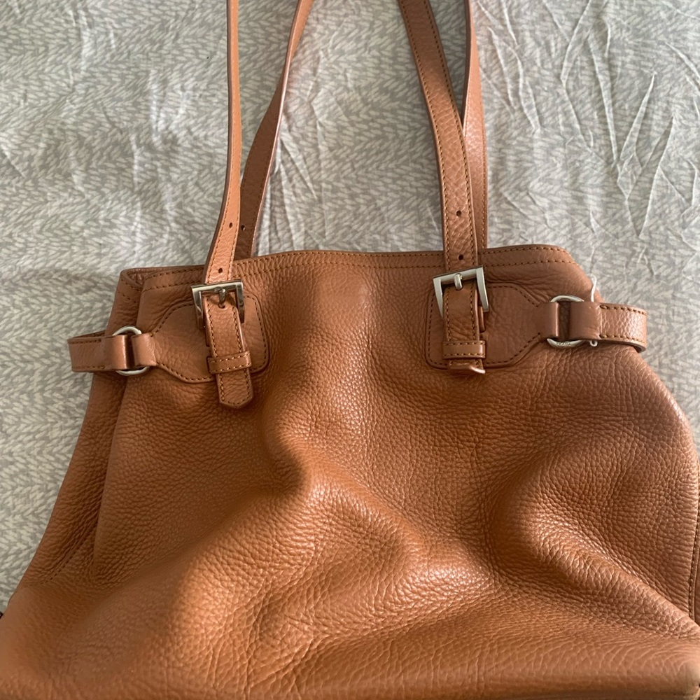 - Prada pebbled camel leather shoulder bag